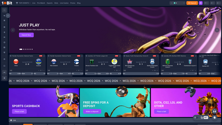 A 1xBet sportsbook homepage showing a 'JUST PLAY' hero banner, a row of live football match cards, a scrolling WQC 2026 strip and three promotional tiles.