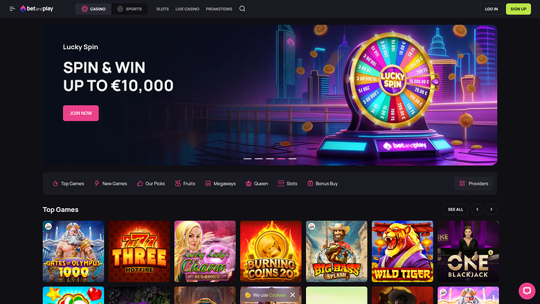 A desktop screenshot of the Betplay online casino homepage showing a Lucky Spin promotion banner and a Top Games grid.