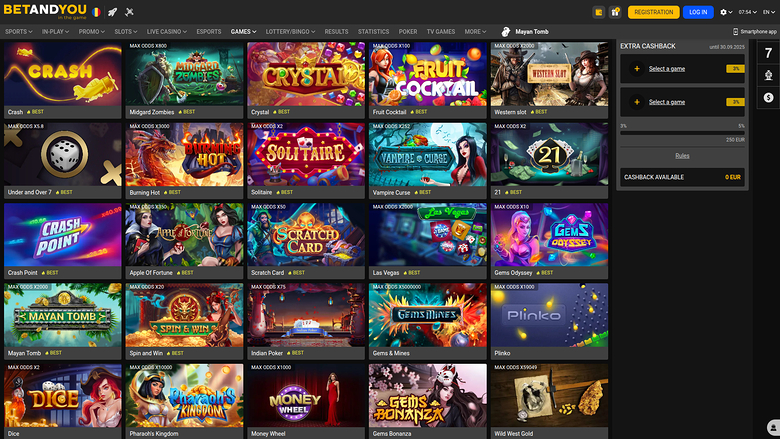 A Betandyou casino lobby page showing a grid of game tiles under a top navigation bar with a logged-in user and an extra cashback panel.