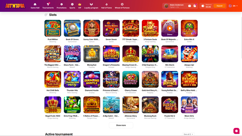 A casino lobby 'Slots' category page showing a grid of 32 slot game tiles under a purple header with account and balance controls.