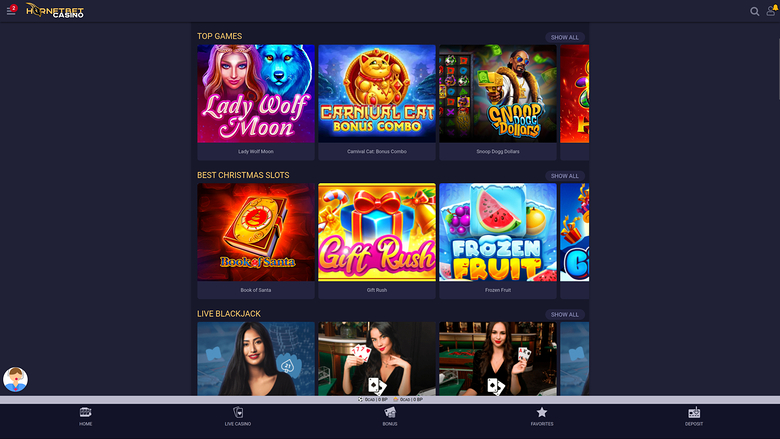 A casino lobby screen showing horizontally scrolling rows of game tiles under the headings Top Games, Best Christmas Slots and Live Blackjack.