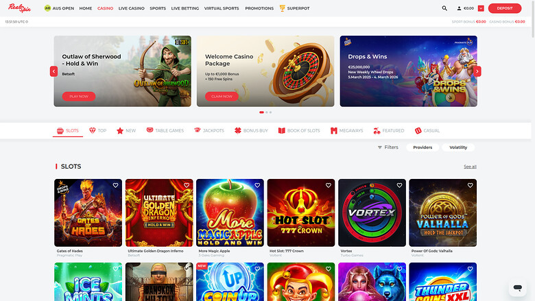 A Redbet online casino lobby shows a promotions carousel above category tabs and a grid of slot game tiles.