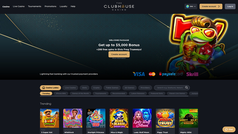 A desktop screenshot of The Clubhouse Casino homepage showing a welcome bonus hero banner, payment provider logos, lobby filter tabs and a Trending row of game