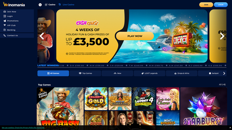 Winomania casino lobby showing a Cash Catch holiday promotion, a latest winners ticker and a Top Games grid.